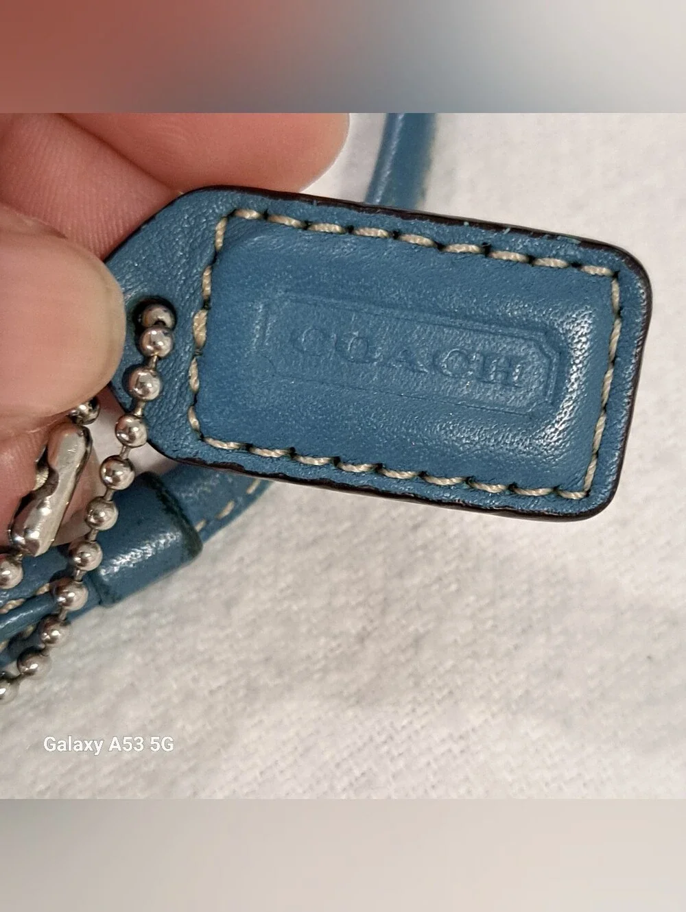 Coach Signature Canvas Wristlet in Brown with Teal Trim
